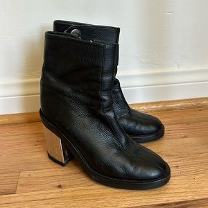 Opening ceremony boot with silver heels